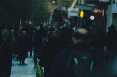 people walking on city street